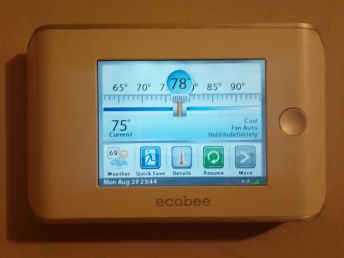 ecobee thermostat mounted on wall